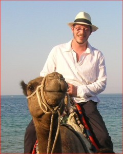 Simon riding Camel